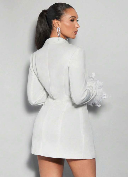 La diva en blazer blanc